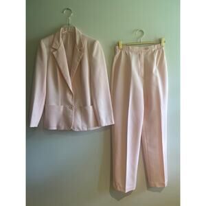 Baby pink polyester 70s disco suit vintage